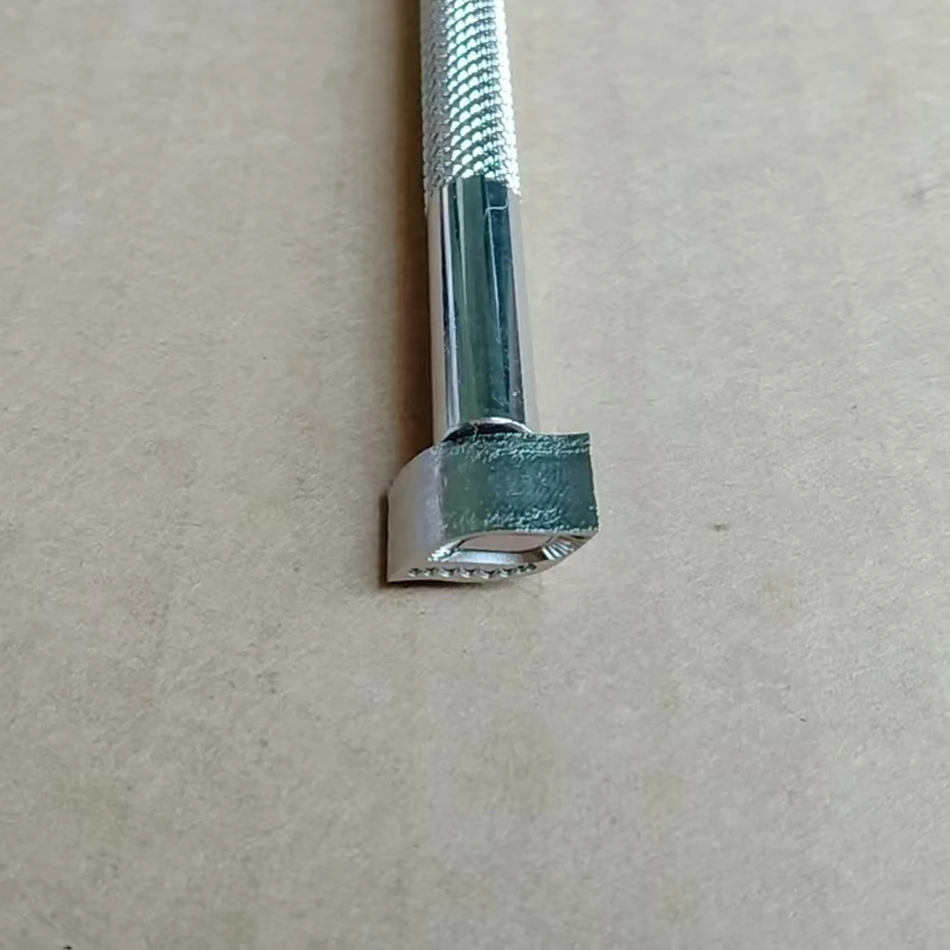 Steel-based precision engraving, leather craftsmanship, metal stamping tools, geometric cord patterns, right side.
Steel-based precision engraving, leather craftsmanship, metal stamping tools, geometric cord patterns, right side.