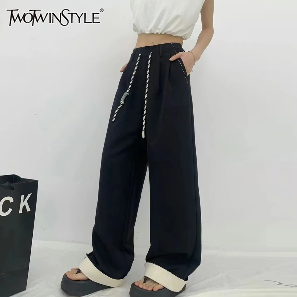 TWOTWINSTYLE Solid Spliced Lace Up Loose Pant for Women High Waist Temperament Wide Leg Pant Female Fashion Style
TWOTWINSTYLE Solid Spliced Lace Up Loose Pant for Women High Waist Temperament Wide Leg Pant Female Fashion Style