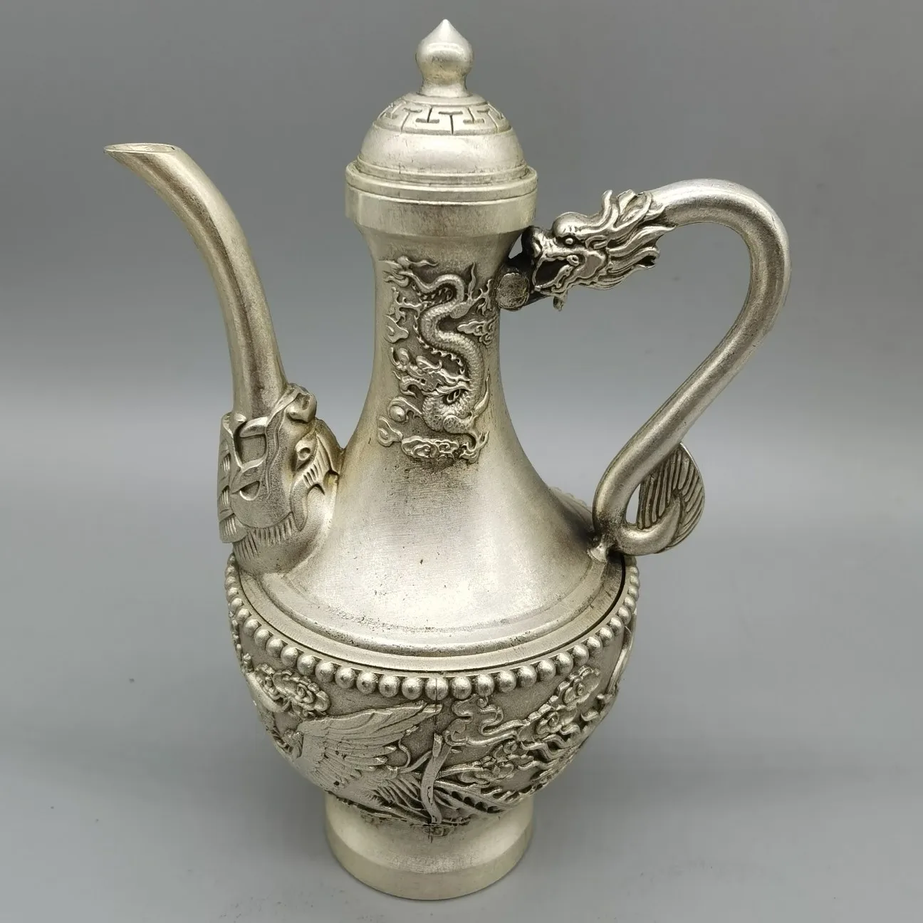 White Copper Silver-Plated Dragon And Phoenix Wine Flask
White Copper Silver-Plated Dragon And Phoenix Wine Flask