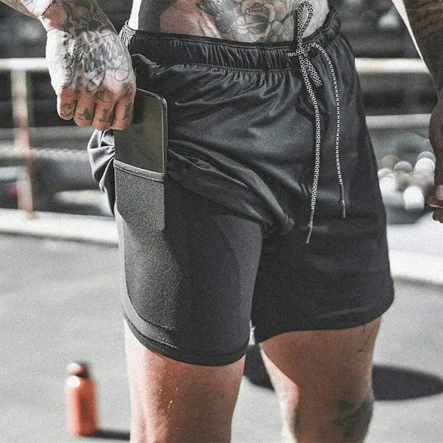Mens 2-In-1 Quick Dry Sports Shorts With Zipper Pockets And Compression Liner
Mens 2-In-1 Quick Dry Sports Shorts With Zipper Pockets And Compression Liner