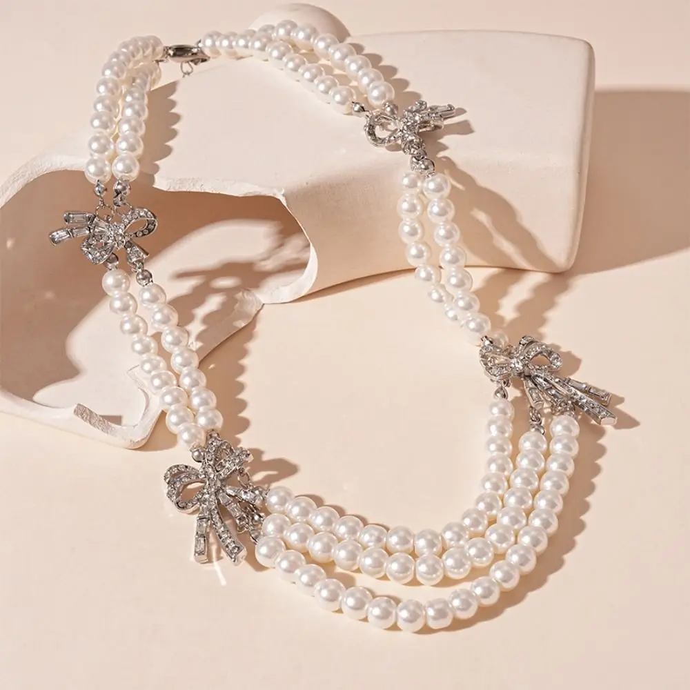 Fashion Vintage Imitation Pearl Necklace Elegant Shiny Multi-layer Chain Light Luxury Temperament Bow Collarbone Chain Gift
Fashion Vintage Imitation Pearl Necklace Elegant Shiny Multi-layer Chain Light Luxury Temperament Bow Collarbone Chain Gift