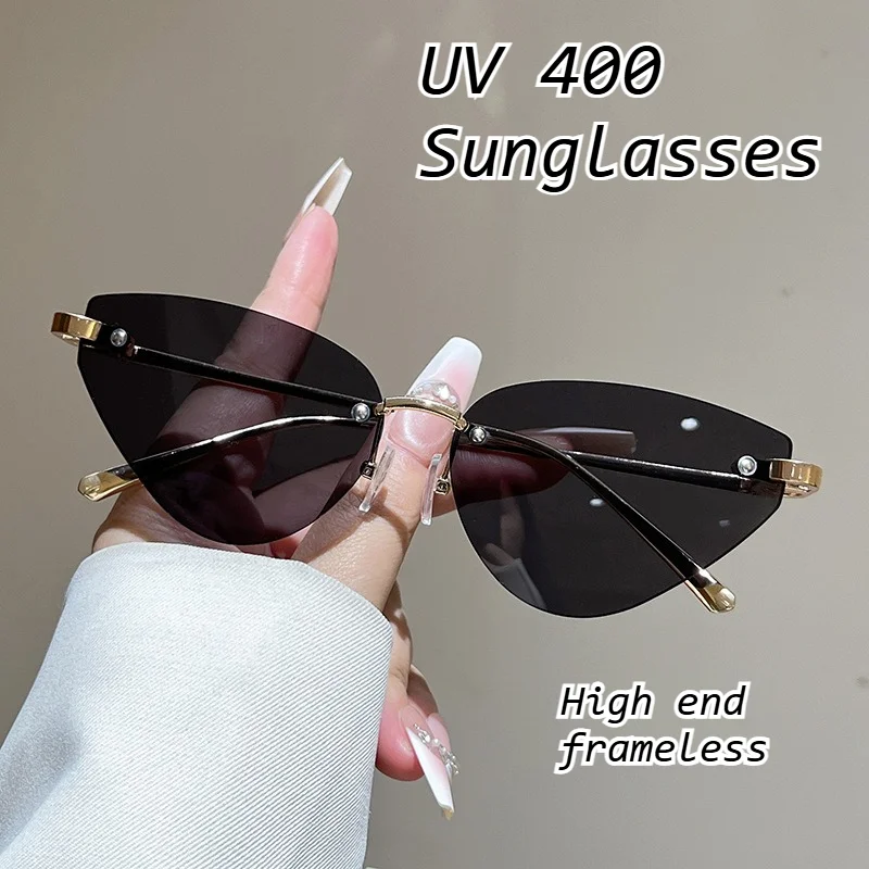 Trendy Rimless Cat Eye Sunglasses for Women UV400 Protection Gradient Lens Fashion Shades Luxury Frameless Sunglasses for Daily
Trendy Rimless Cat Eye Sunglasses for Women UV400 Protection Gradient Lens Fashion Shades Luxury Frameless Sunglasses for Daily
