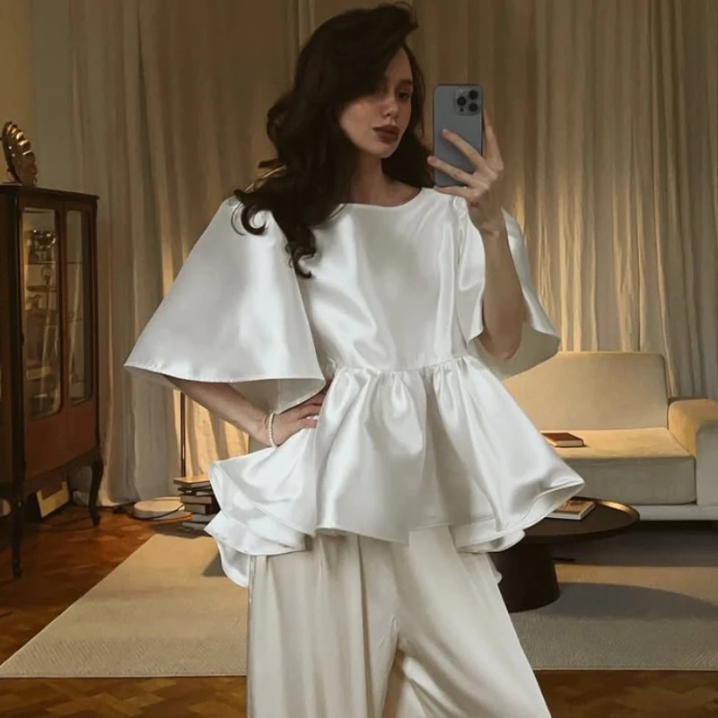 TARUXY Elegant Satin Top Women's Crew Neck Ruffled Flared-Sleeve Casual Shirt 2026 Summer Casual Stylish Commuter Female T-Shirt
TARUXY Elegant Satin Top Women's Crew Neck Ruffled Flared-Sleeve Casual Shirt 2026 Summer Casual Stylish Commuter Female T-Shirt