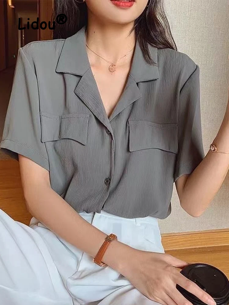 Solid Color Office Lady Single-breasted Blouse 2022 New Summer Niche Design Short Sleeve Loose Fashionable Chiffon Shirt
Solid Color Office Lady Single-breasted Blouse 2022 New Summer Niche Design Short Sleeve Loose Fashionable Chiffon Shirt