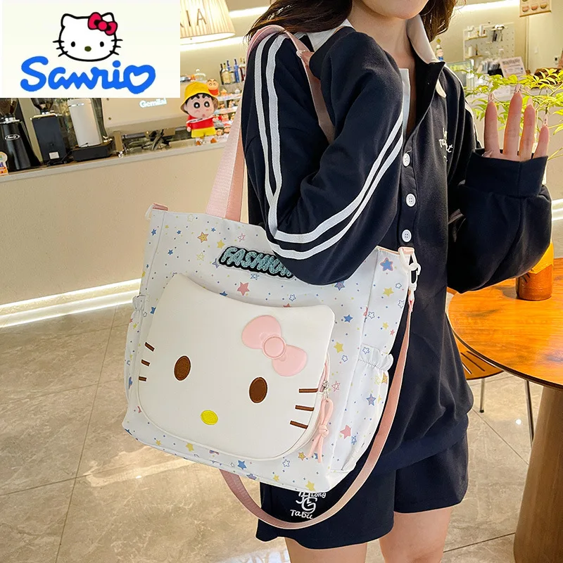 Sanrio модная новая милая сумка через плечо Hello Kitty, студенческая простая и универсальная повседневная сумка через плечо большой вместимости 
Sanrio модная новая милая сумка через плечо Hello Kitty, студенческая простая и универсальная повседневная сумка через плечо большой вместимости