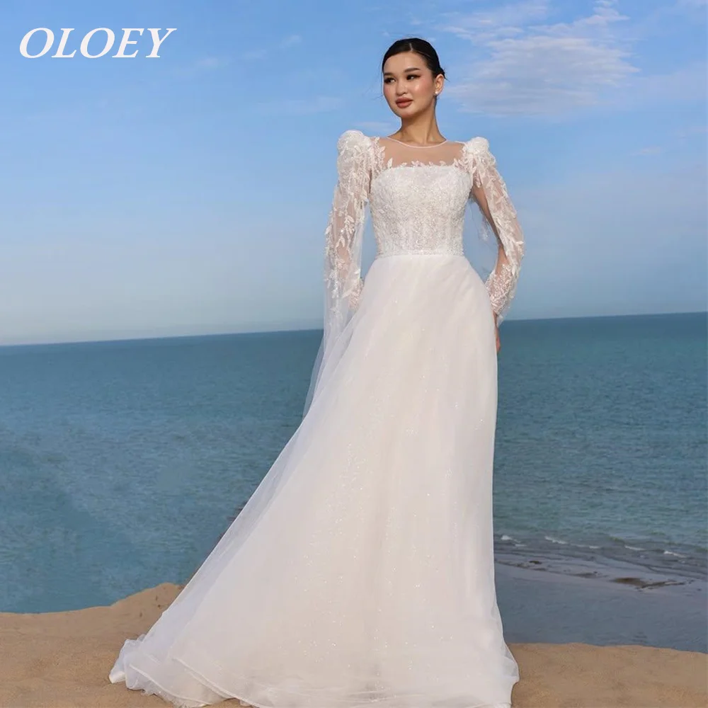 OLOEY Luxury Beading A-line Wedding Dress Gliter Tulle Full Puff Sleeves Bridal Gown Customized Modest فساتين زفاف
OLOEY Luxury Beading A-line Wedding Dress Gliter Tulle Full Puff Sleeves Bridal Gown Customized Modest فساتين زفاف