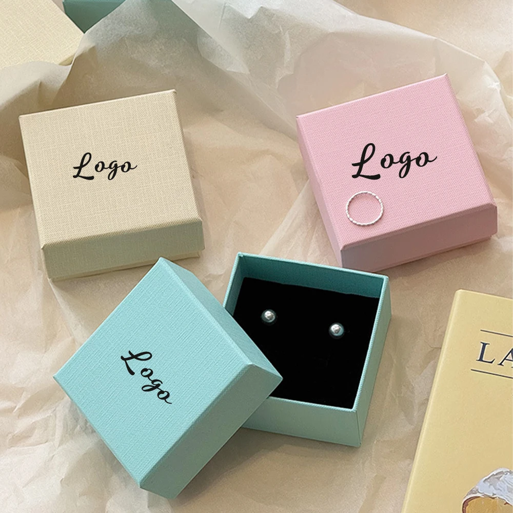 24/50/100pcs Texture Jewelry Gift Box Custom Logo 8x8x4cm White Coffee Pink Paper Case For Ring Earring Bracelet Pendant Storage
24/50/100pcs Texture Jewelry Gift Box Custom Logo 8x8x4cm White Coffee Pink Paper Case For Ring Earring Bracelet Pendant Storage