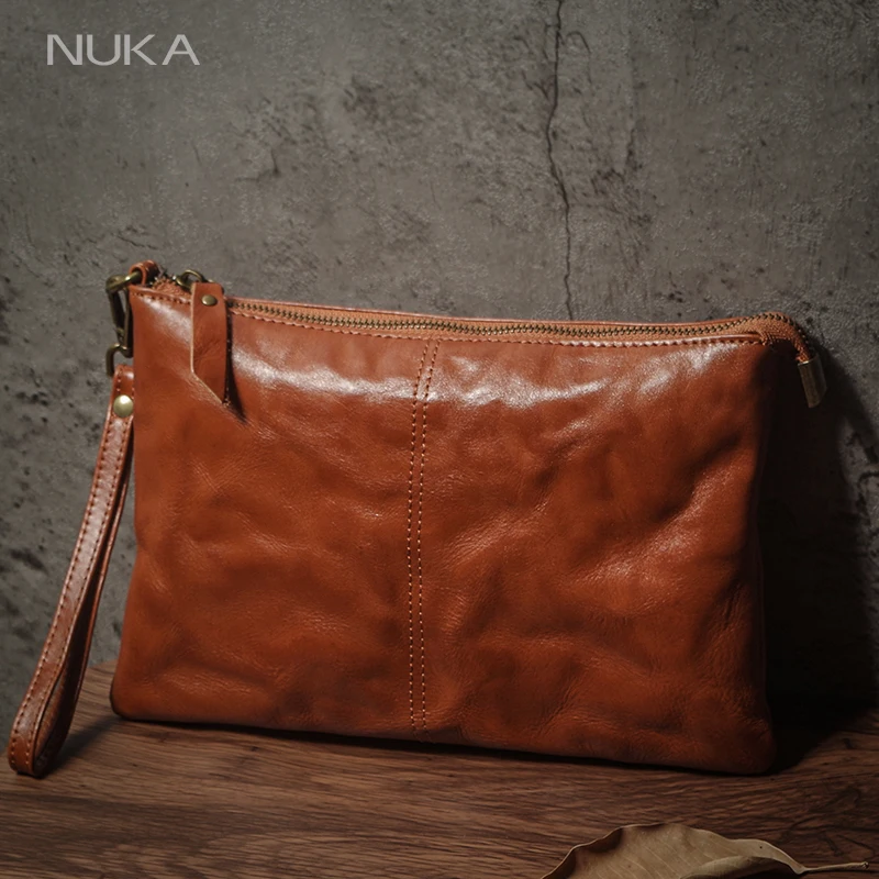NUKA Men's Genuine Leather Clutch Bag High Quality Armpit Bags Simple Portable Wristlet Bag Business Handbag Vintage Money Pouch
NUKA Men's Genuine Leather Clutch Bag High Quality Armpit Bags Simple Portable Wristlet Bag Business Handbag Vintage Money Pouch