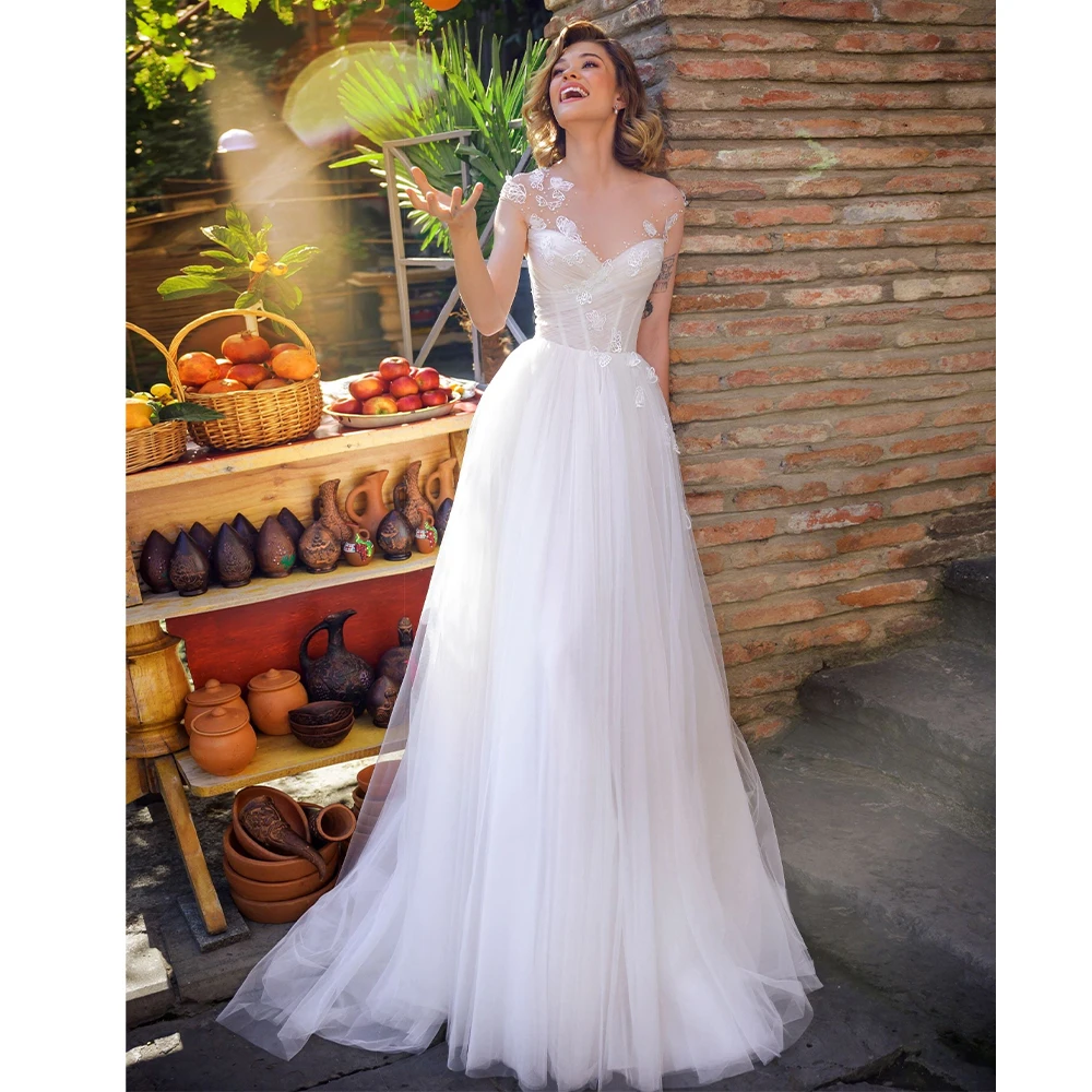 Mophiel Tull Wedding Dresses Sleeveless A Line Summer Bride Dress Appliques Beach Garden Bridal Gown vestido de novia Customized
Mophiel Tull Wedding Dresses Sleeveless A Line Summer Bride Dress Appliques Beach Garden Bridal Gown vestido de novia Customized