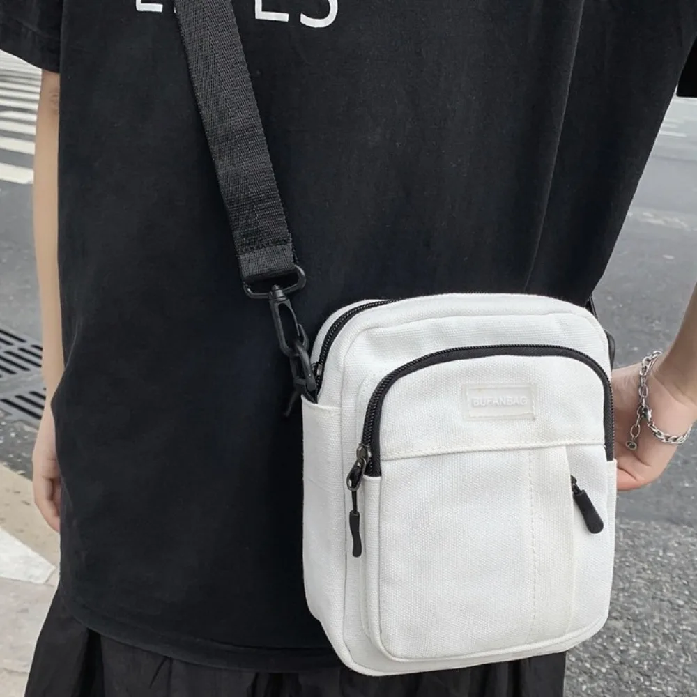 Simple Nylon Men's Shoulder Bag Square Multifunctional Canvas Crossbody Bag Korean Style Large Capacity Sports Phone Bag Outdoor
Simple Nylon Men's Shoulder Bag Square Multifunctional Canvas Crossbody Bag Korean Style Large Capacity Sports Phone Bag Outdoor