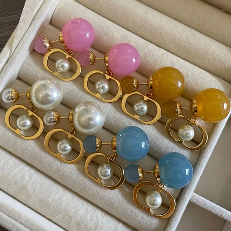 Luxury Sweet Candy Double Side Round Beads D Stud Earrings for Women C Letter Pearl Earrings Temperament Designer Jewelry Gift
Luxury Sweet Candy Double Side Round Beads D Stud Earrings for Women C Letter Pearl Earrings Temperament Designer Jewelry Gift