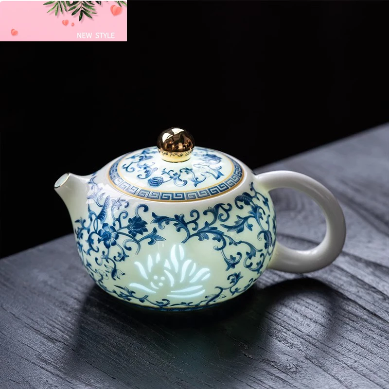 Blue and White of hollowing out Teapot Home Vintage Handmade Ceramic Handle Pot Kung Fu Tea Set Tea Infuser
Blue and White of hollowing out Teapot Home Vintage Handmade Ceramic Handle Pot Kung Fu Tea Set Tea Infuser
