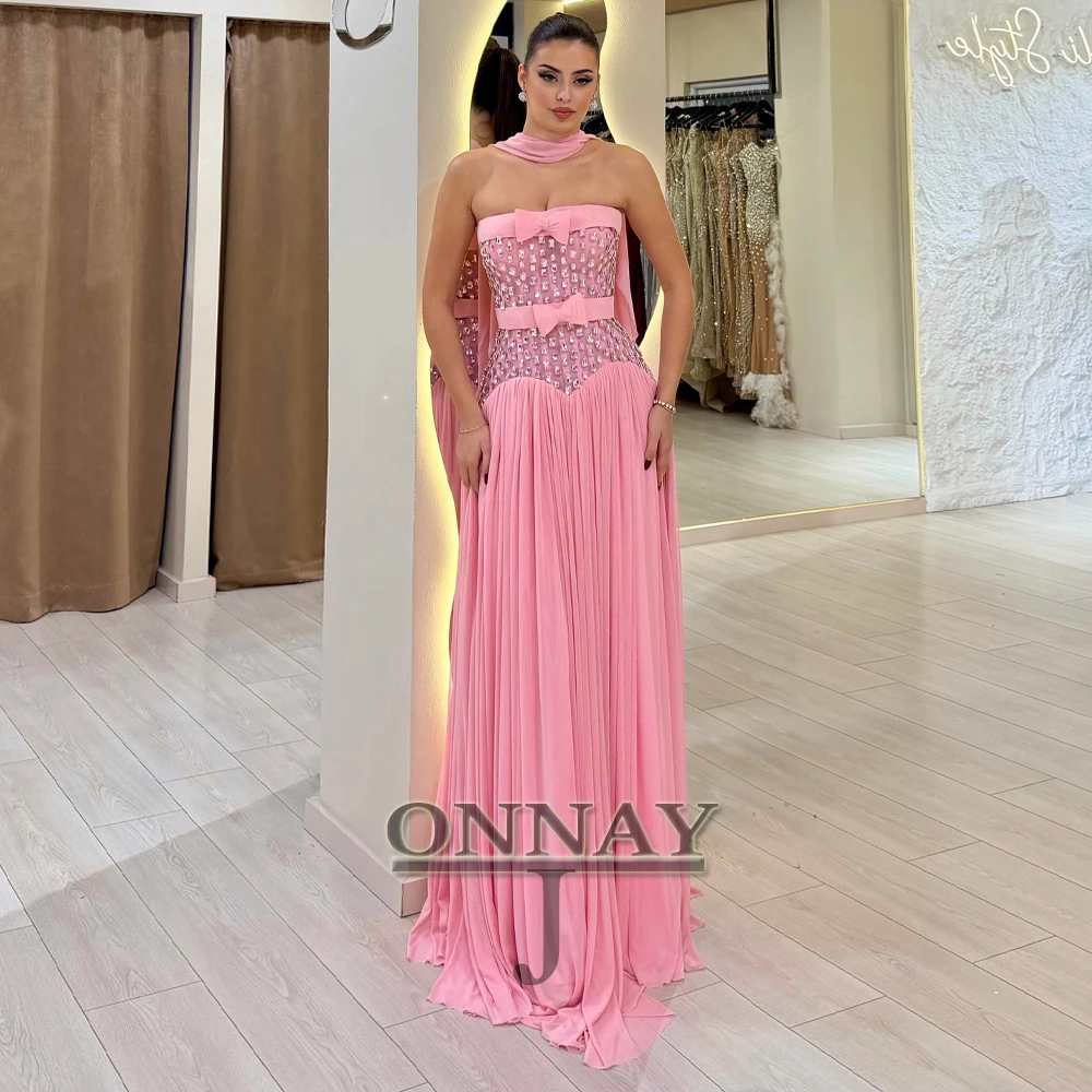 Модные вечерние платья без бретелек по индивидуальному заказу, шарф с бантом и кристаллами, плиссированные Aline Sash Suadi Arabric Vestidos De Fiesta Plus
Модные вечерние платья без бретелек по индивидуальному заказу, шарф с бантом и кристаллами, плиссированные Aline Sash Suadi Arabric Vestidos De Fiesta Plus