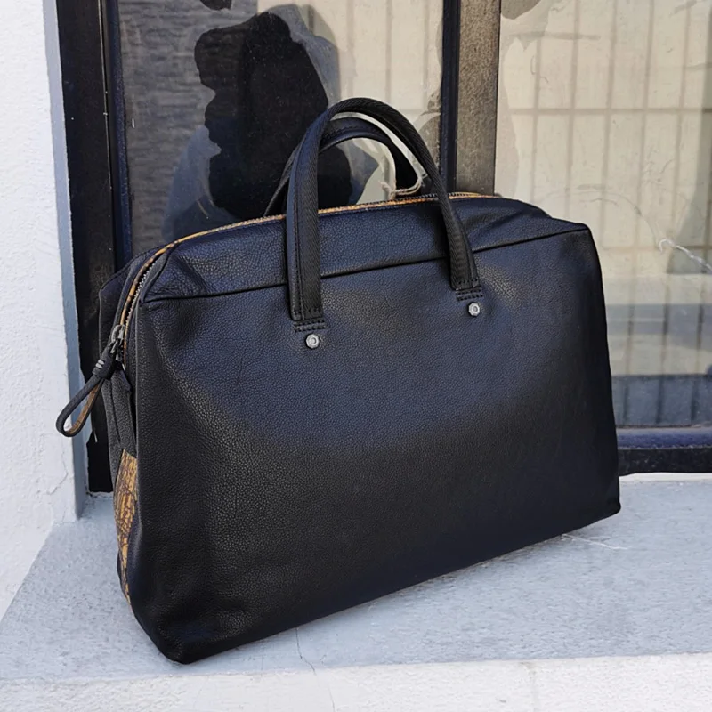 Cowhide Soft Black Leather Men simple travel bag large-capacity first layer women business trip luggage bag portable bags
Cowhide Soft Black Leather Men simple travel bag large-capacity first layer women business trip luggage bag portable bags