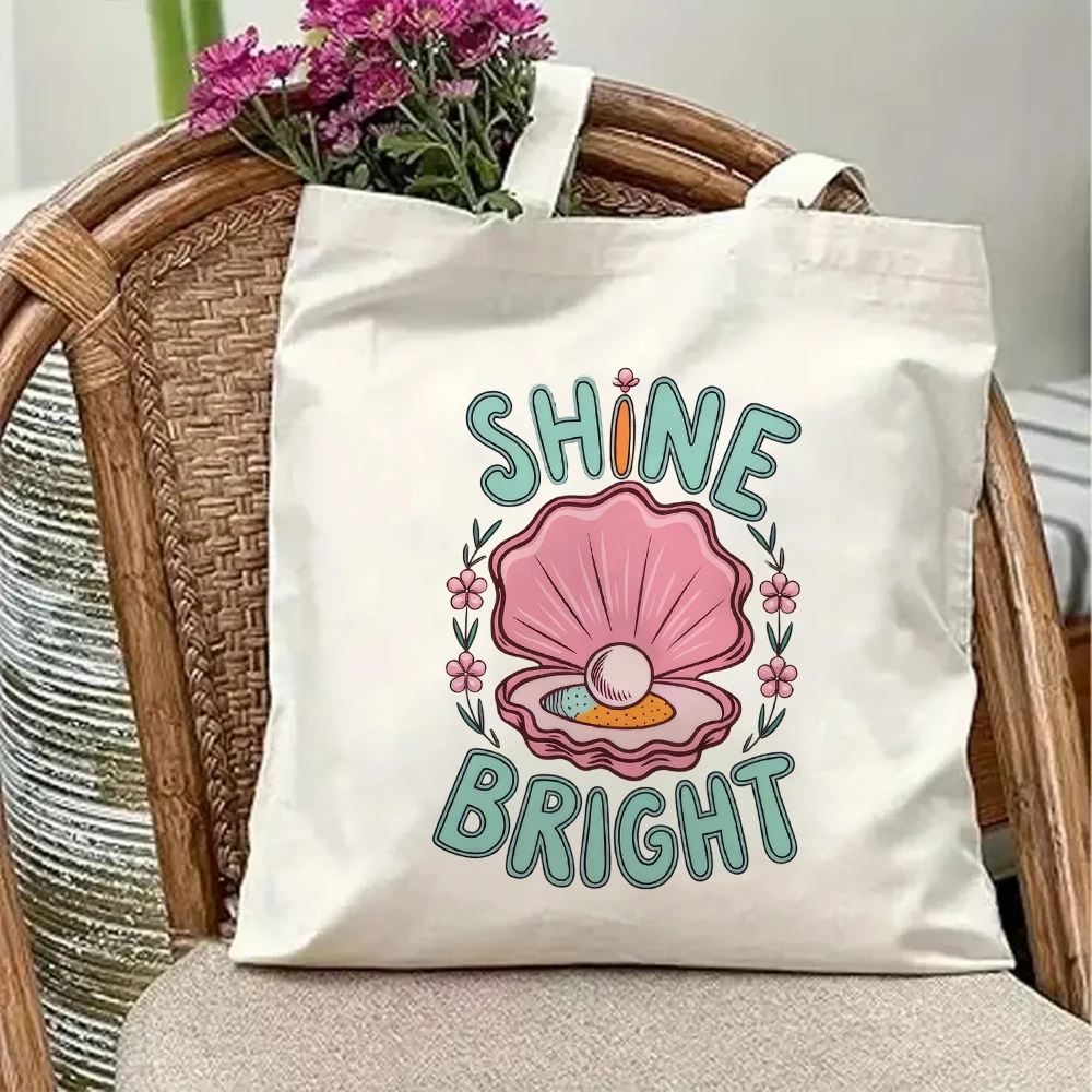 Shine Bright Canvas Tote Bag Cute Pink Pearl Seashell Graphic Print Aesthetic Coquette Shoulder Purse Reusable Beach Bag
Shine Bright Canvas Tote Bag Cute Pink Pearl Seashell Graphic Print Aesthetic Coquette Shoulder Purse Reusable Beach Bag