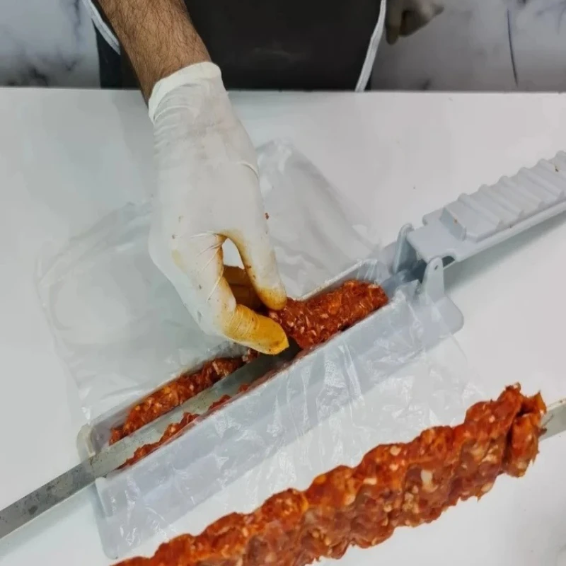 Single Row Kebab Maker Bbq Meat Skewer Machine Kebab Press Maker Reusable Plastic Bbq Skewer Maker Kebab Preparation BBQ Tool 
Single Row Kebab Maker Bbq Meat Skewer Machine Kebab Press Maker Reusable Plastic Bbq Skewer Maker Kebab Preparation BBQ Tool