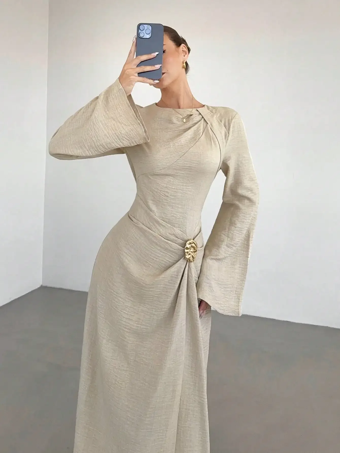 Elegant Beige Twist Front Metal Buckle Flare Sleeve Long Dress For Women
Elegant Beige Twist Front Metal Buckle Flare Sleeve Long Dress For Women
