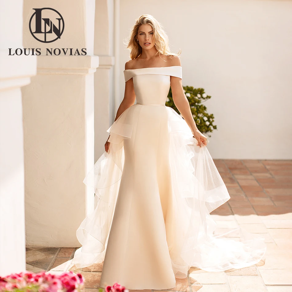 LOUIS NOVIAS Свадебные платья русалки для женщин с вырезом лодочкой и открытыми плечами, атласное свадебное платье со съемным шлейфом, Vestidos De Novia
LOUIS NOVIAS Свадебные платья русалки для женщин с вырезом лодочкой и открытыми плечами, атласное свадебное платье со съемным шлейфом, Vestidos De Novia