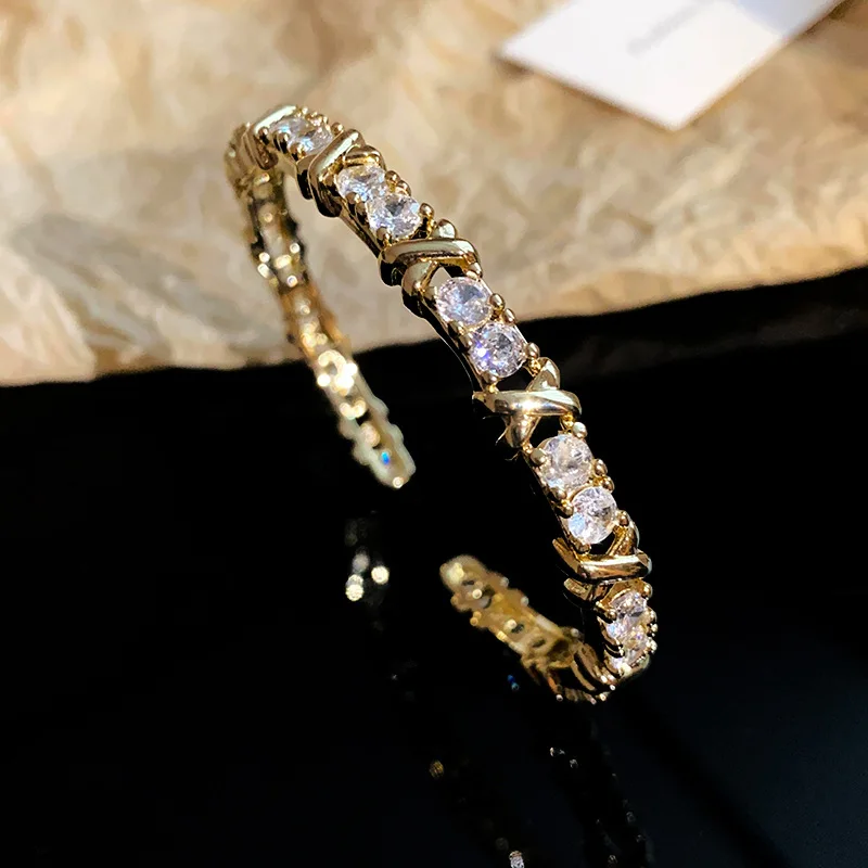RAKOL модный позолоченный микроциркон X-образный открывающийся браслет для женщин браслет с наручниками новый дизайн роскошные вечерние украшения
RAKOL модный позолоченный микроциркон X-образный открывающийся браслет для женщин браслет с наручниками новый дизайн роскошные вечерние украшения
