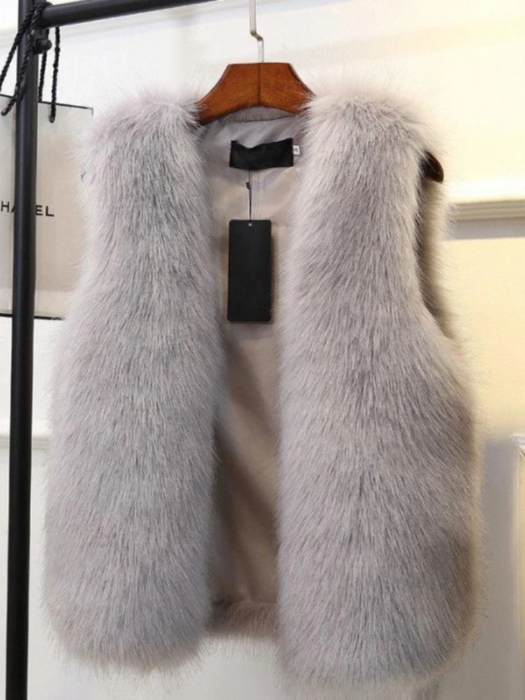 Осень-зима, новый элегантный универсальный женский однотонный жилет из искусственного меха, пальто в Корейском стиле, свободная повседневная майка из искусственного меха
Осень-зима, новый элегантный универсальный женский однотонный жилет из искусственного меха, пальто в Корейском стиле, свободная повседневная майка из искусственного меха