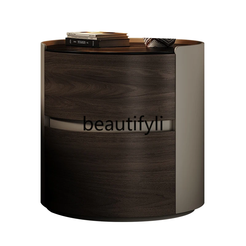 New light luxury high-end small bedside storage cabinet New round Italian minimalist bedside table
New light luxury high-end small bedside storage cabinet New round Italian minimalist bedside table