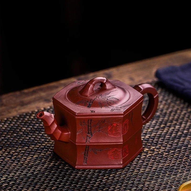 Yixing Handmade Purple Clay Pot Hundred Eyes Dragon Blood Sand Bamboo Melody Kung Fu Tea Set Chinese Teapot 400ml
Yixing Handmade Purple Clay Pot Hundred Eyes Dragon Blood Sand Bamboo Melody Kung Fu Tea Set Chinese Teapot 400ml