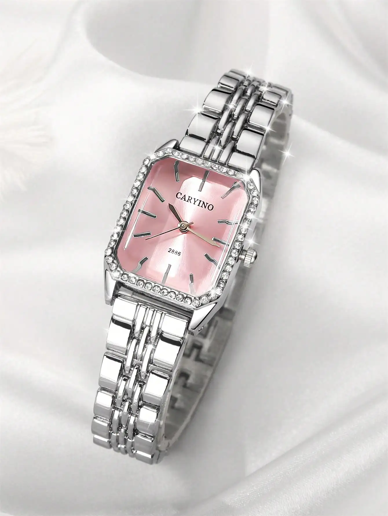 Элегантные квадратные кварцевые часы из нержавеющей стали с розовым циферблатом и хрустальным безелем для женщин
Элегантные квадратные кварцевые часы из нержавеющей стали с розовым циферблатом и хрустальным безелем для женщин