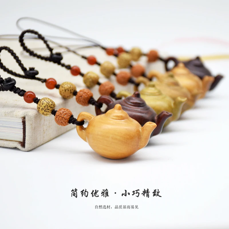 Handle pot phone chain pendant carry hand pieces Rosewood Dalbergia hupeana green sandalwood car key ring pendant small gift
Handle pot phone chain pendant carry hand pieces Rosewood Dalbergia hupeana green sandalwood car key ring pendant small gift