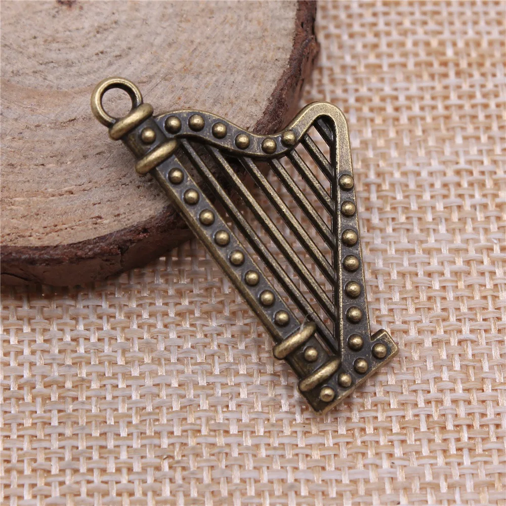 8pcs 40x21mm(1.57x0.83inch) 2 Colors Antique Bronze Color Antique Silver Color Harp Charms Hand Crafts Accessories
8pcs 40x21mm(1.57x0.83inch) 2 Colors Antique Bronze Color Antique Silver Color Harp Charms Hand Crafts Accessories