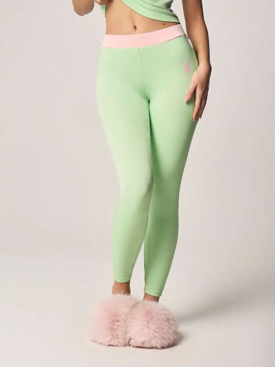 Mint Green Lounge Set Featuring Camisole Top And Leggings With Pink Waistband And Bunny Emblem For Sleep Or Relaxation
Mint Green Lounge Set Featuring Camisole Top And Leggings With Pink Waistband And Bunny Emblem For Sleep Or Relaxation