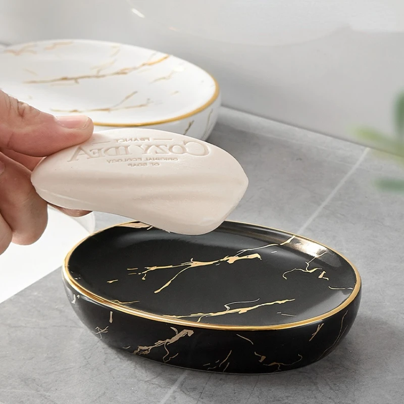 Light luxury soap box ceramic toilet rack soap box drain drain shelf creative storage household soap dish
Light luxury soap box ceramic toilet rack soap box drain drain shelf creative storage household soap dish