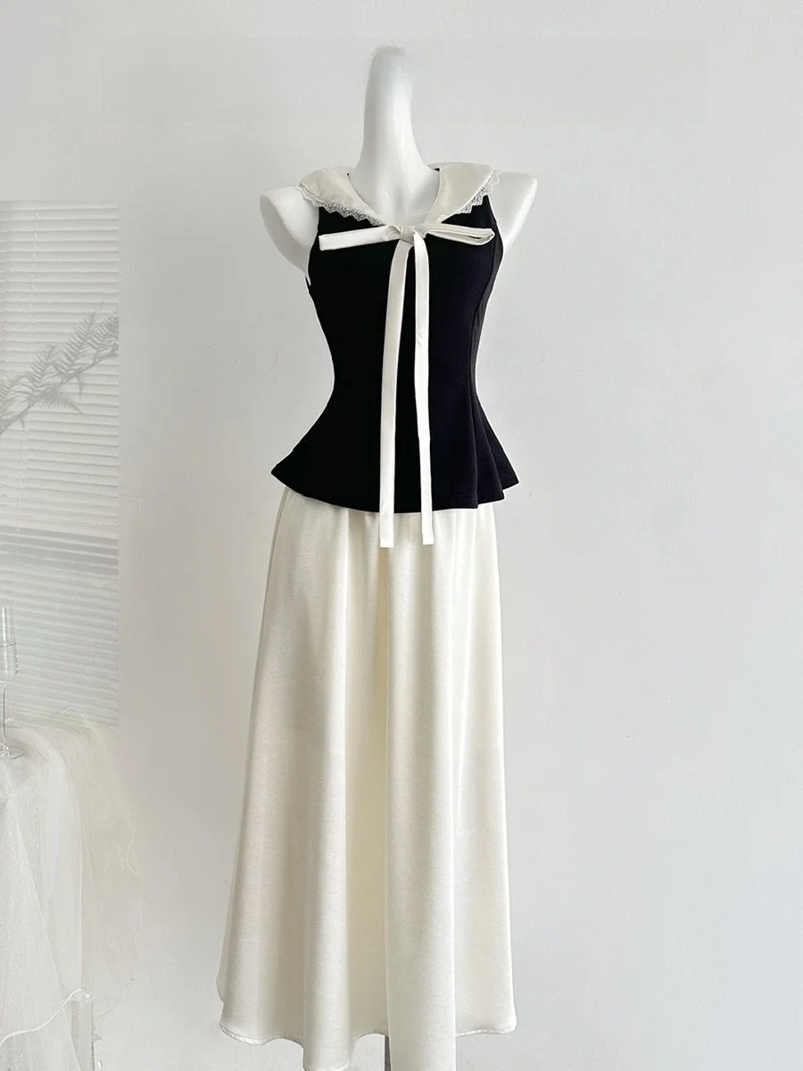 Luckymann Vintage Style Sleeveless Collared Lace Trim Color Block Waist Cinched Top with Satin Half Skirt Summer Fashion Set
Luckymann Vintage Style Sleeveless Collared Lace Trim Color Block Waist Cinched Top with Satin Half Skirt Summer Fashion Set