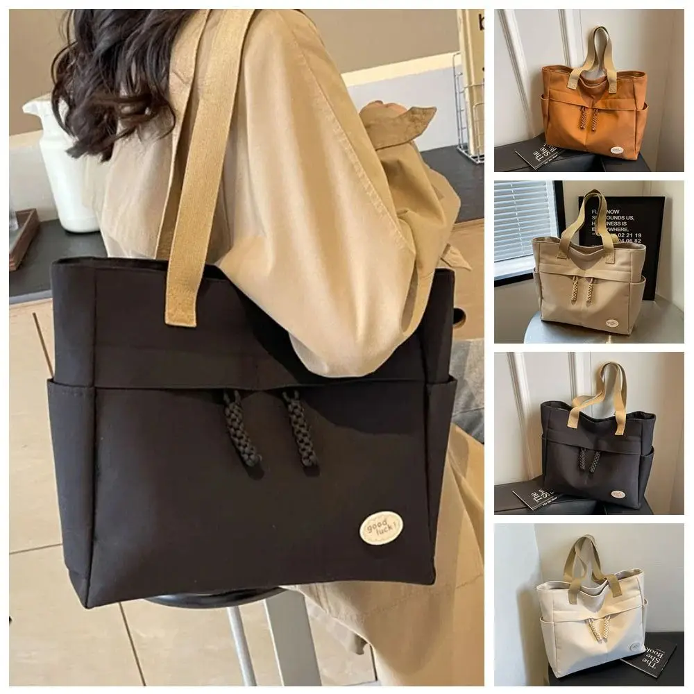 Shoulder Bag Solid Color Canvas Bag Multi Pocket Street Style Simple Handbag Shopping Bag Large Capacity Japanese Style Tote Bag
Shoulder Bag Solid Color Canvas Bag Multi Pocket Street Style Simple Handbag Shopping Bag Large Capacity Japanese Style Tote Bag