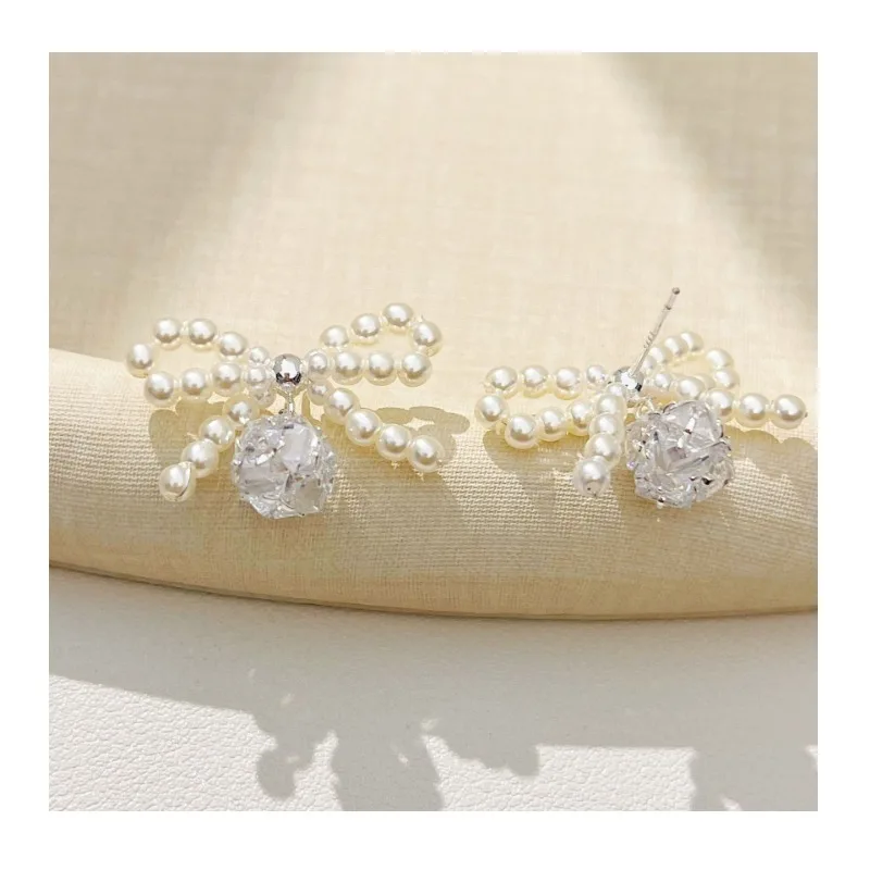 Korean Needle Pearl Versatile Simple Bow Stud Earrings Women's Niche Style Explosive Earrings
Korean Needle Pearl Versatile Simple Bow Stud Earrings Women's Niche Style Explosive Earrings