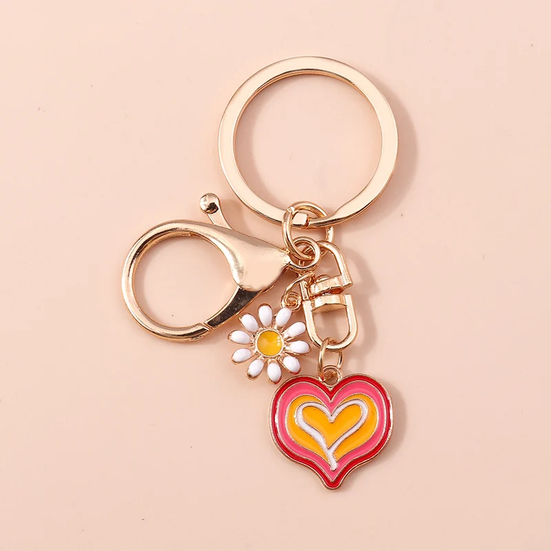 Cute Enamel Love Heart Keychain Daisy Key Ring Pendant for Car Key Holder Women Girls Handbag Decor DIY Handmade Jewelry Gifts
Cute Enamel Love Heart Keychain Daisy Key Ring Pendant for Car Key Holder Women Girls Handbag Decor DIY Handmade Jewelry Gifts