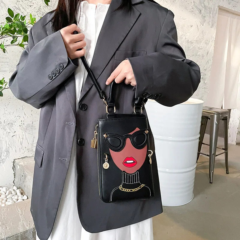 New European and American fashion creative spoof fun beautiful woman expression rivet sunglasses contrasting color bag
New European and American fashion creative spoof fun beautiful woman expression rivet sunglasses contrasting color bag
