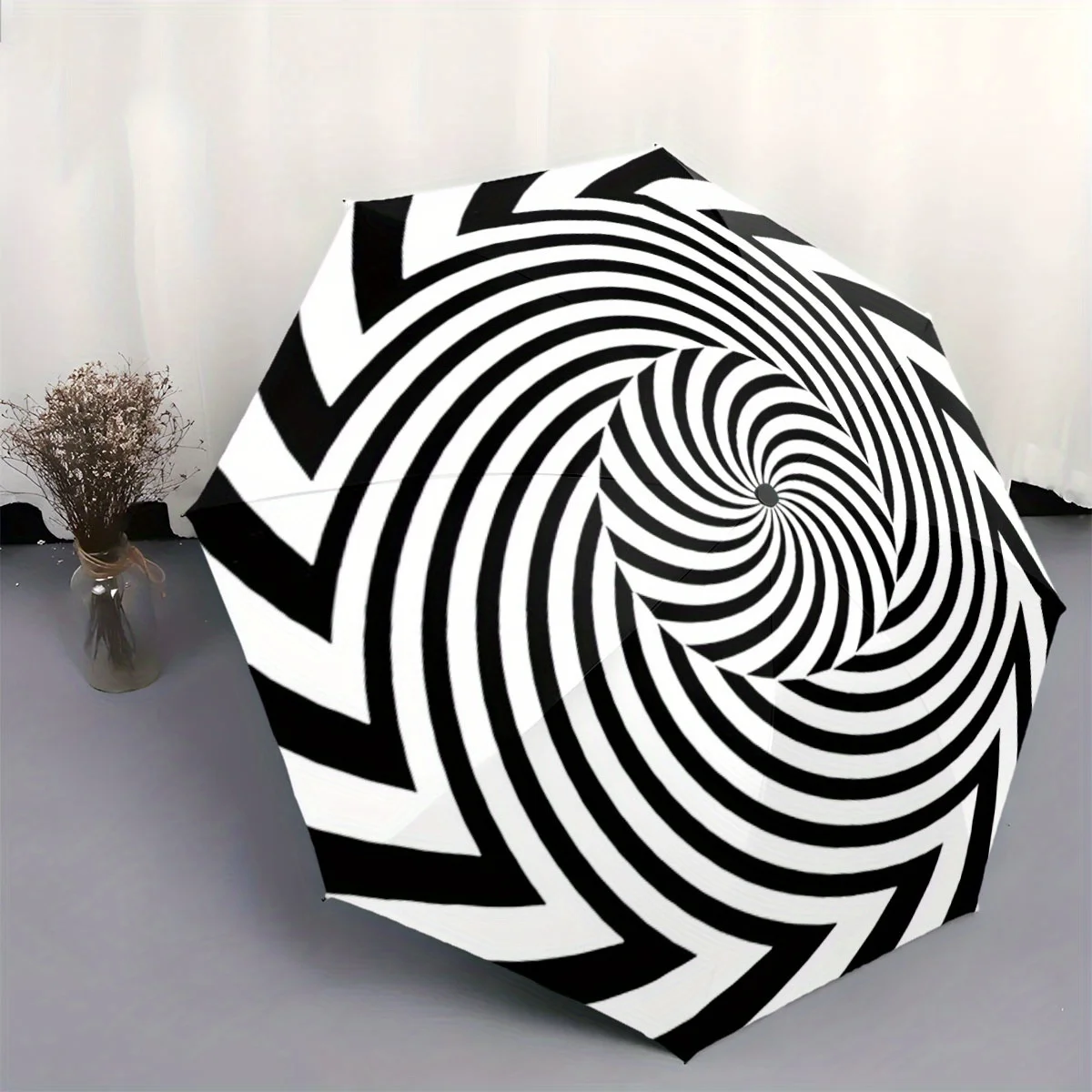 Автоматический складной зонт с черно-белым оптическим иллюзорным дизайном в виде спирали - портативный, легкий, прочный, с прочной рамой.
Автоматический складной зонт с черно-белым оптическим иллюзорным дизайном в виде спирали - портативный, легкий, прочный, с прочной рамой.
