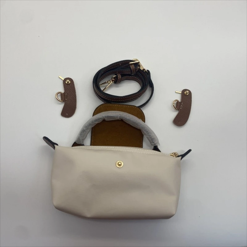 Y2K New Lc Waterproof Nylon Shoulder Bag For Women Fashion Detachable Mini Handbag With Adjustable Strap Casual Crossbody Tote
Y2K New Lc Waterproof Nylon Shoulder Bag For Women Fashion Detachable Mini Handbag With Adjustable Strap Casual Crossbody Tote