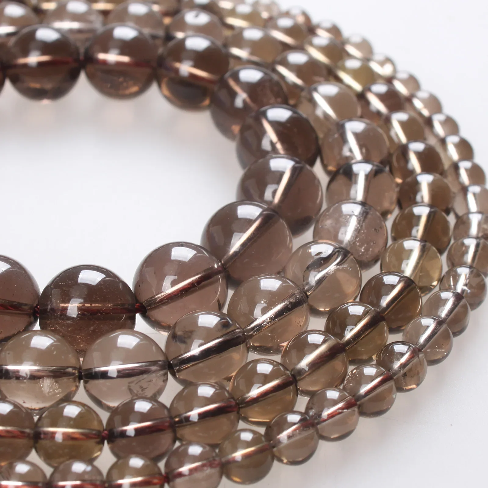Natural Stone Beads AAA Smoky Crystal Quartz Beads Round Loose Beads 4 6 8 10 12mm For Bracelets Necklace Jewelry Making
Natural Stone Beads AAA Smoky Crystal Quartz Beads Round Loose Beads 4 6 8 10 12mm For Bracelets Necklace Jewelry Making