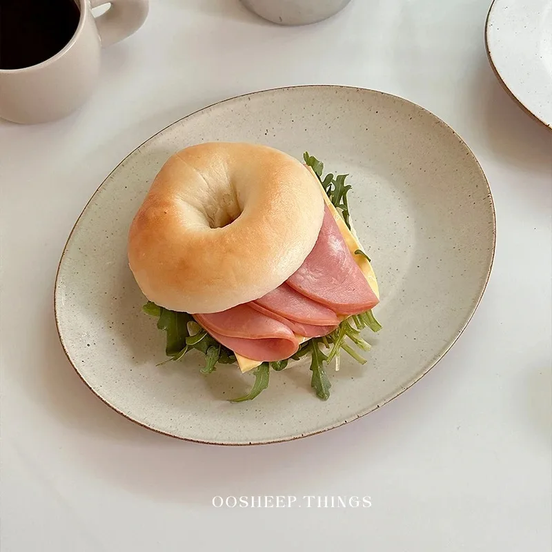 Japanese retro oval plate coarse pottery wabi-sabi wind plate set meal tableware old breakfast plate
Japanese retro oval plate coarse pottery wabi-sabi wind plate set meal tableware old breakfast plate