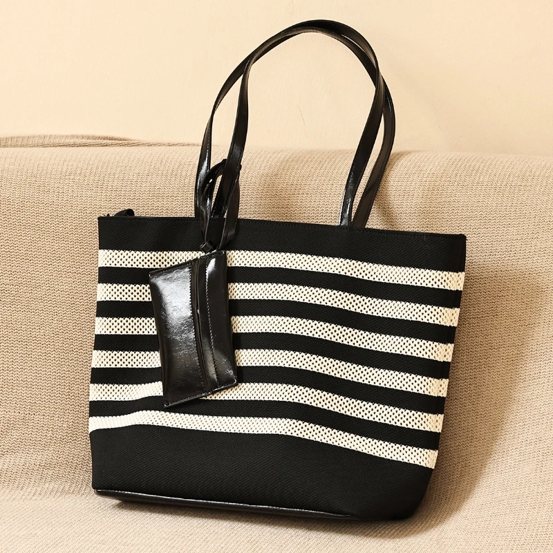 New Simple Casual Black White Stripes Design Woven Tote Bag for Women Suitable for Summer Travel and Vacation Beach Shoulder Bag
New Simple Casual Black White Stripes Design Woven Tote Bag for Women Suitable for Summer Travel and Vacation Beach Shoulder Bag