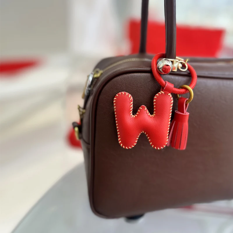 Original design, hand sewn genuine leather letter bag pendant, Instagram blogger, same high-end hanging accessory, keychain
Original design, hand sewn genuine leather letter bag pendant, Instagram blogger, same high-end hanging accessory, keychain