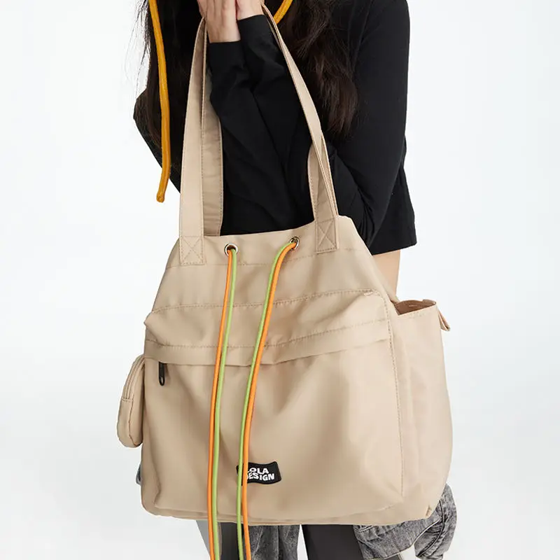 Canvas Drawstring Large Capacity Tote Bag Commuting Class Student Shoulder Bag Simple Fashion Casual Shopper Handbag For Women
Canvas Drawstring Large Capacity Tote Bag Commuting Class Student Shoulder Bag Simple Fashion Casual Shopper Handbag For Women