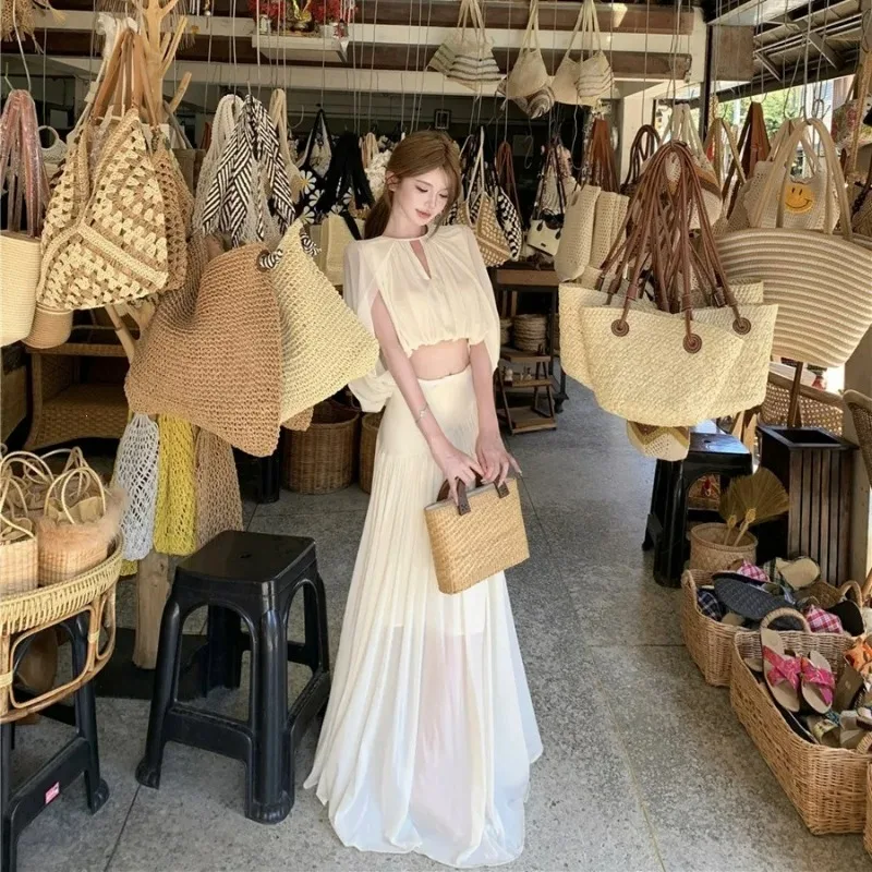 Vacation Outfit Set Women Apricot-colored Sleeveless Top High-waisted Skirt Design Sense Two-piece Fashionable Simple Women Wear
Vacation Outfit Set Women Apricot-colored Sleeveless Top High-waisted Skirt Design Sense Two-piece Fashionable Simple Women Wear