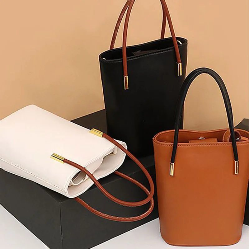New retro multifunction solid portable handbag luxury designer commuting high quality soft leather simple women's bucket bag
New retro multifunction solid portable handbag luxury designer commuting high quality soft leather simple women's bucket bag