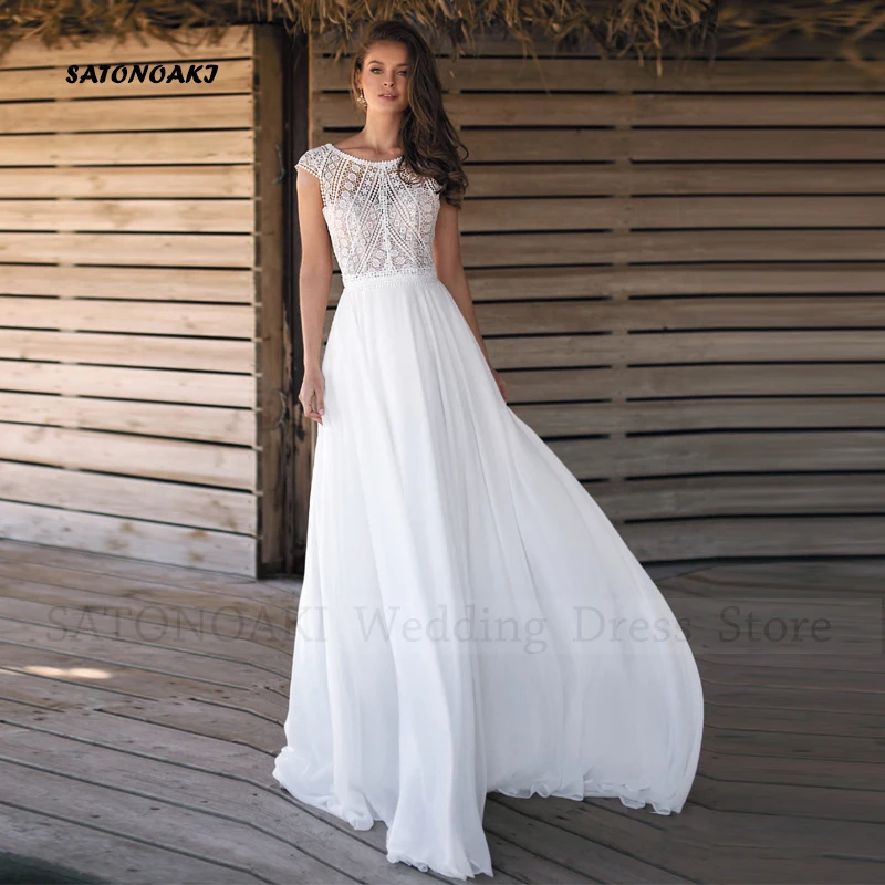Vestidos De Novia Elegant Boho Chiffon Wedding Dress Sleeveless O-neck Backless Lace Appliques Bride Gown Robe Mariée Custom
Vestidos De Novia Elegant Boho Chiffon Wedding Dress Sleeveless O-neck Backless Lace Appliques Bride Gown Robe Mariée Custom