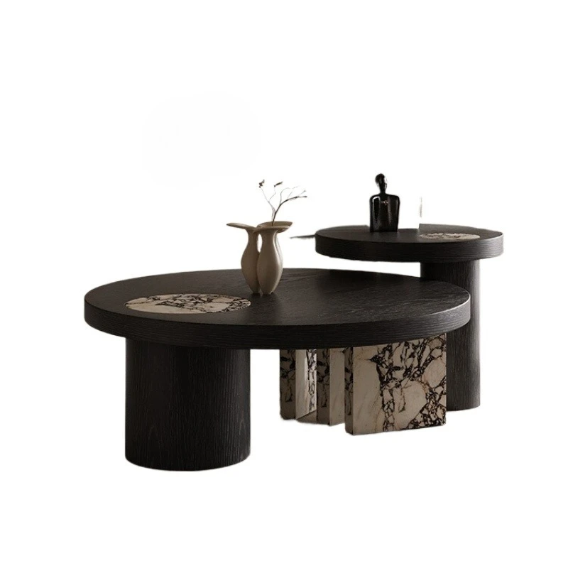 Italian high and low combination rock slab round coffee table light luxury high-end living room furniture
Italian high and low combination rock slab round coffee table light luxury high-end living room furniture