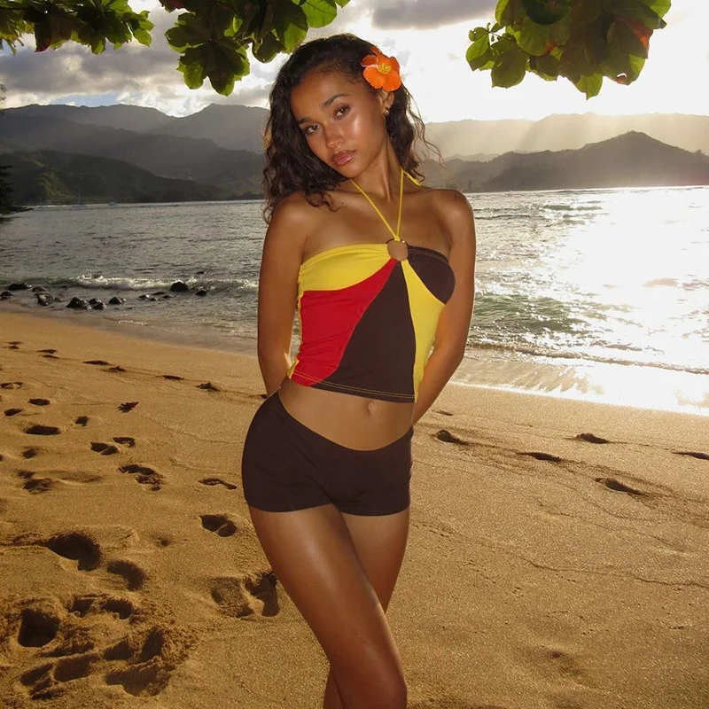 Wind 2025 Spring/Summer New Product Women's Seaside Vacation Style Hanging Neck, Bareback Tank Top, Hip Hugging Tight Shorts Set
Wind 2025 Spring/Summer New Product Women's Seaside Vacation Style Hanging Neck, Bareback Tank Top, Hip Hugging Tight Shorts Set