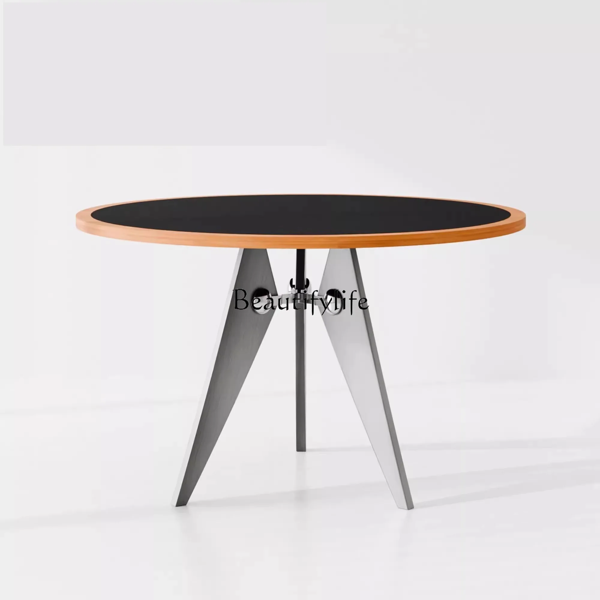 Small apartment stainless steel solid wood Bauhaus style retro color matching dining round table
Small apartment stainless steel solid wood Bauhaus style retro color matching dining round table