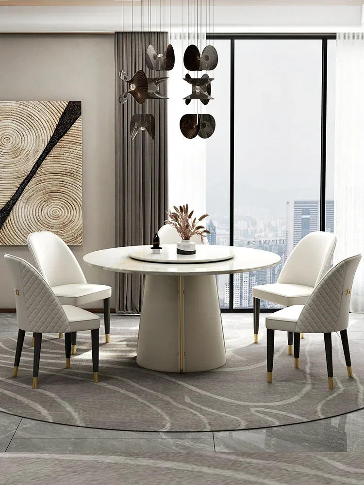 Light luxury rock plate dining round table modern simple and bright household white Pandora marble dining table and chair combin
Light luxury rock plate dining round table modern simple and bright household white Pandora marble dining table and chair combin
